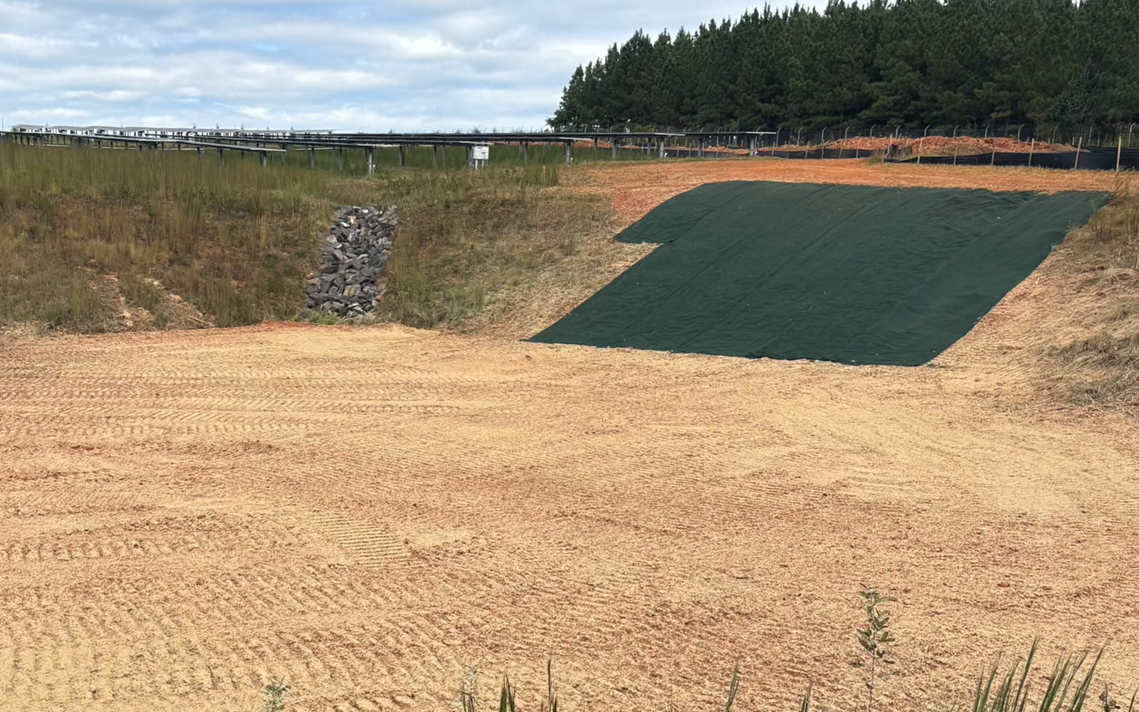 Completed grading and drainage work on a commercial site